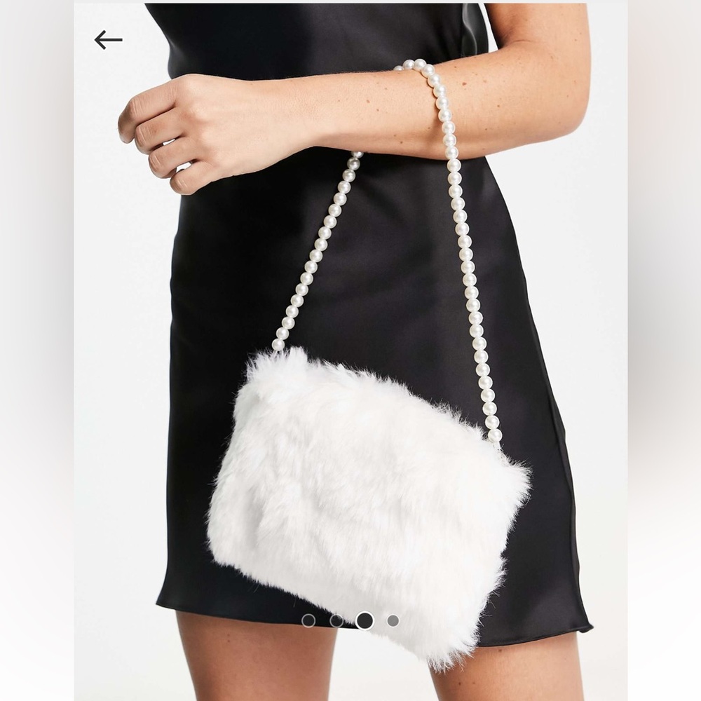 True Decadence shoulder bag in white faux feather with pearl strap